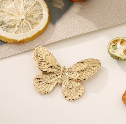 Broche papillon